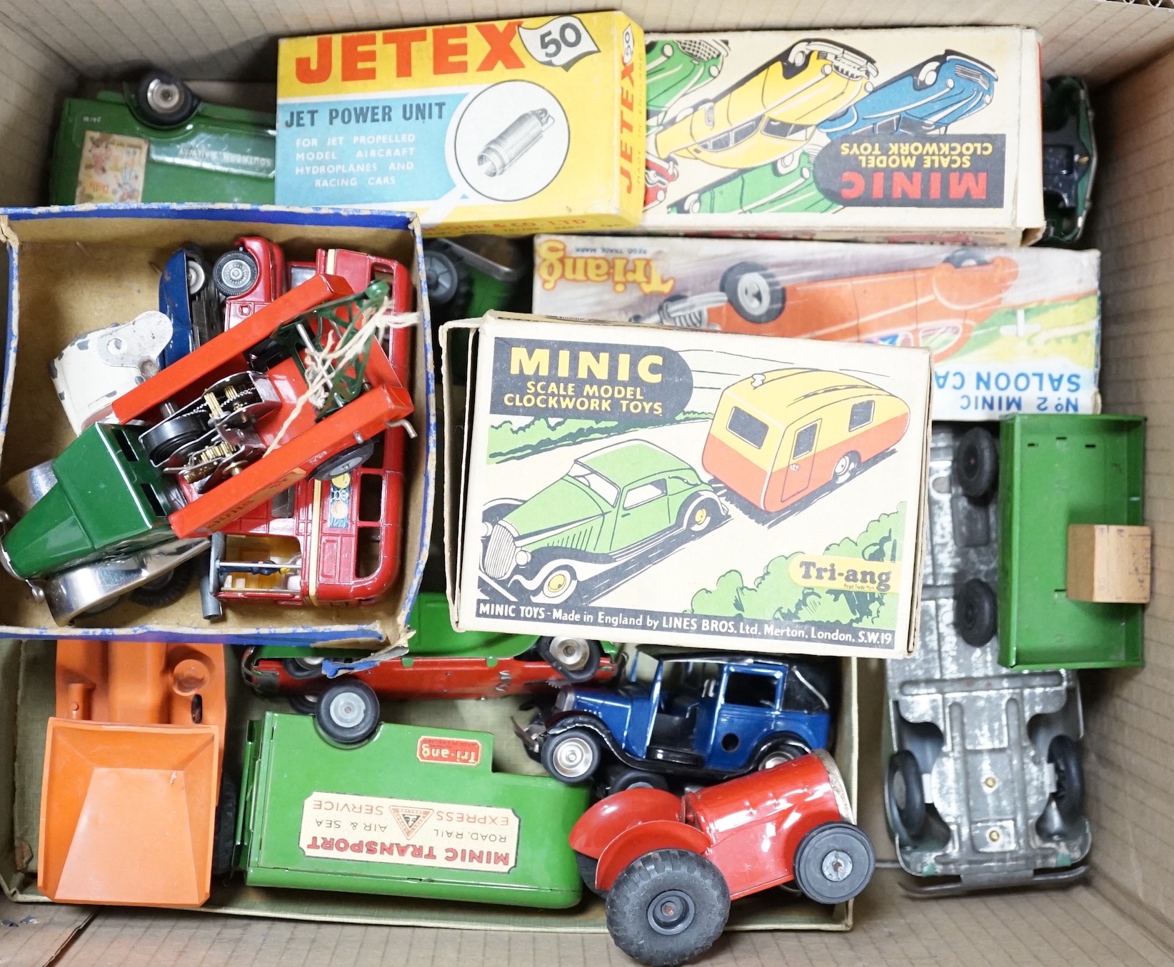 A collection of tin plate model vehicles, to include a boxed Tri-ang model of a Vauxhall Cabriolet & caravan from the Minic clockwork toys collection, and others